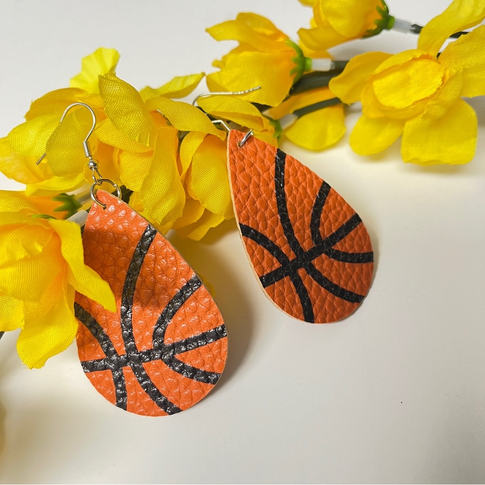 Teardrop PU leather basketball pattern earrings. Textured feel. New. 2.25” long.